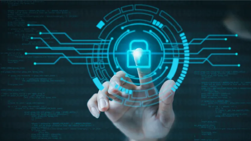 Image representing cybersecurity, showing a glowing lock and a hand symbolizing control and protection of digital systems.