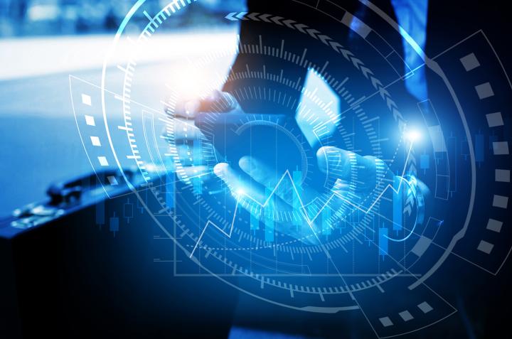 young business man using mobile phone with graphic chart of stock market investment trading for Forex trading, digital technology, investment and global business