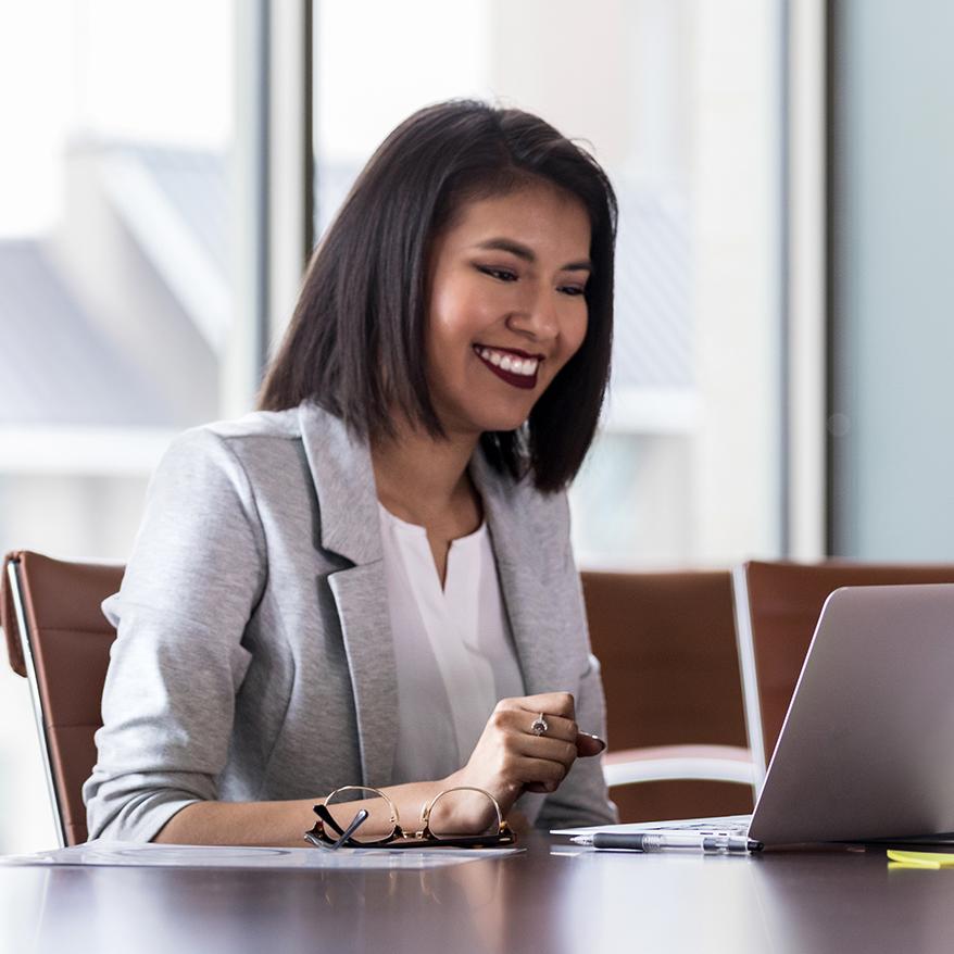 Woman sitting in front of computer