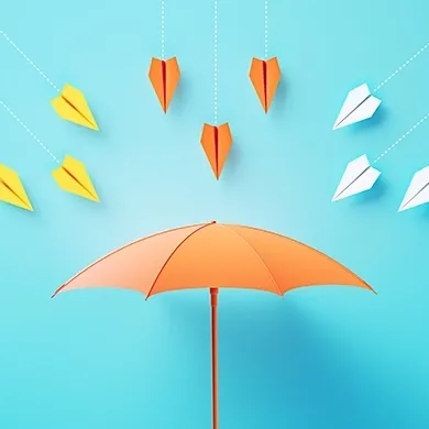 An orange umbrella on a blue background with paper airplanes shooting down upon it. 