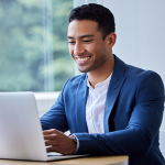 Professional Man Typing on Computer