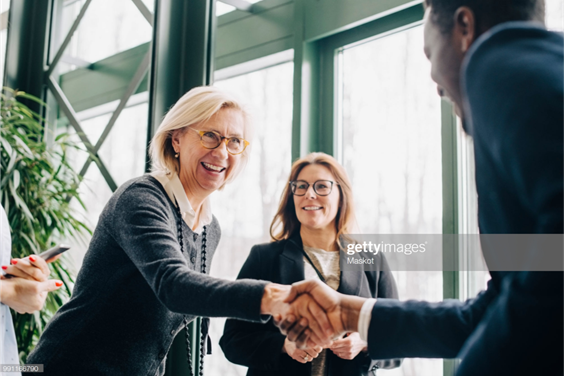 Two people shaking hands