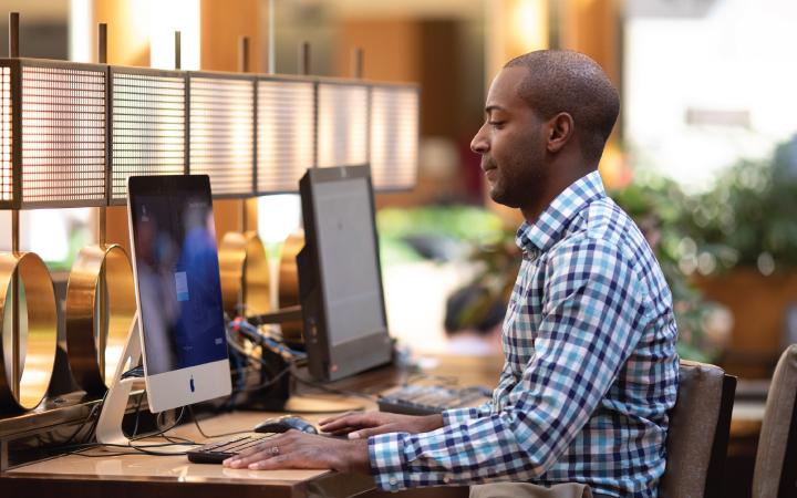 Man sitting at a computer