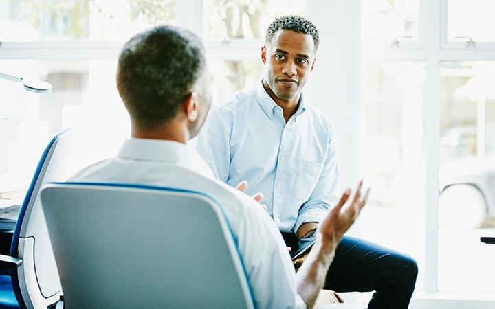 Two men having discussion