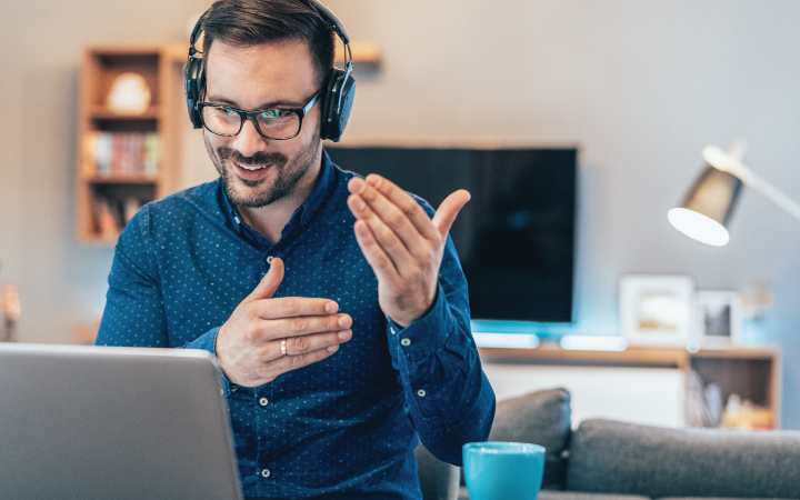 a person on a laptop with headphones on