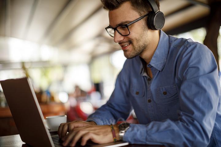 Man studying CE at a computer