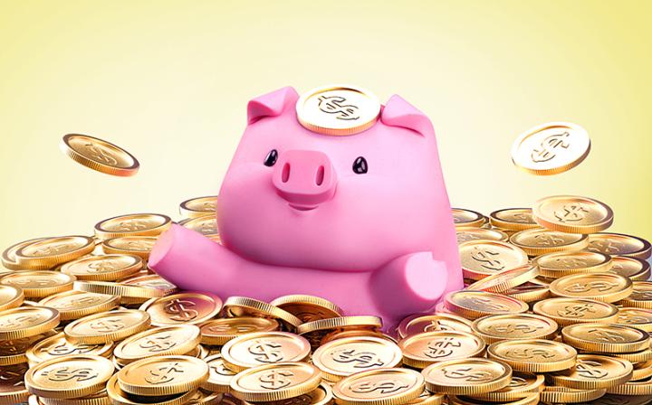 A pink piggy bank swims cutely in a bath of gold coins. 