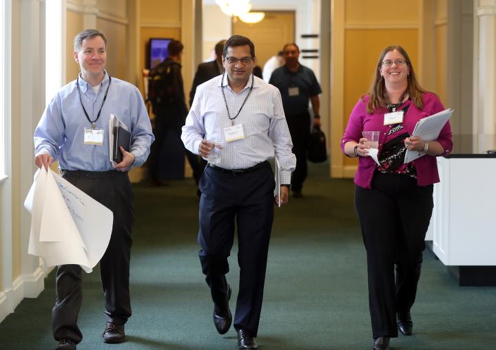 Participants of the Business Strategy for Emerging Leaders program walking confidently