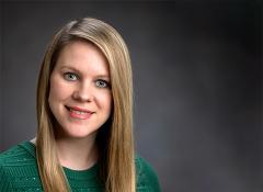 close up headshot of woman smiling