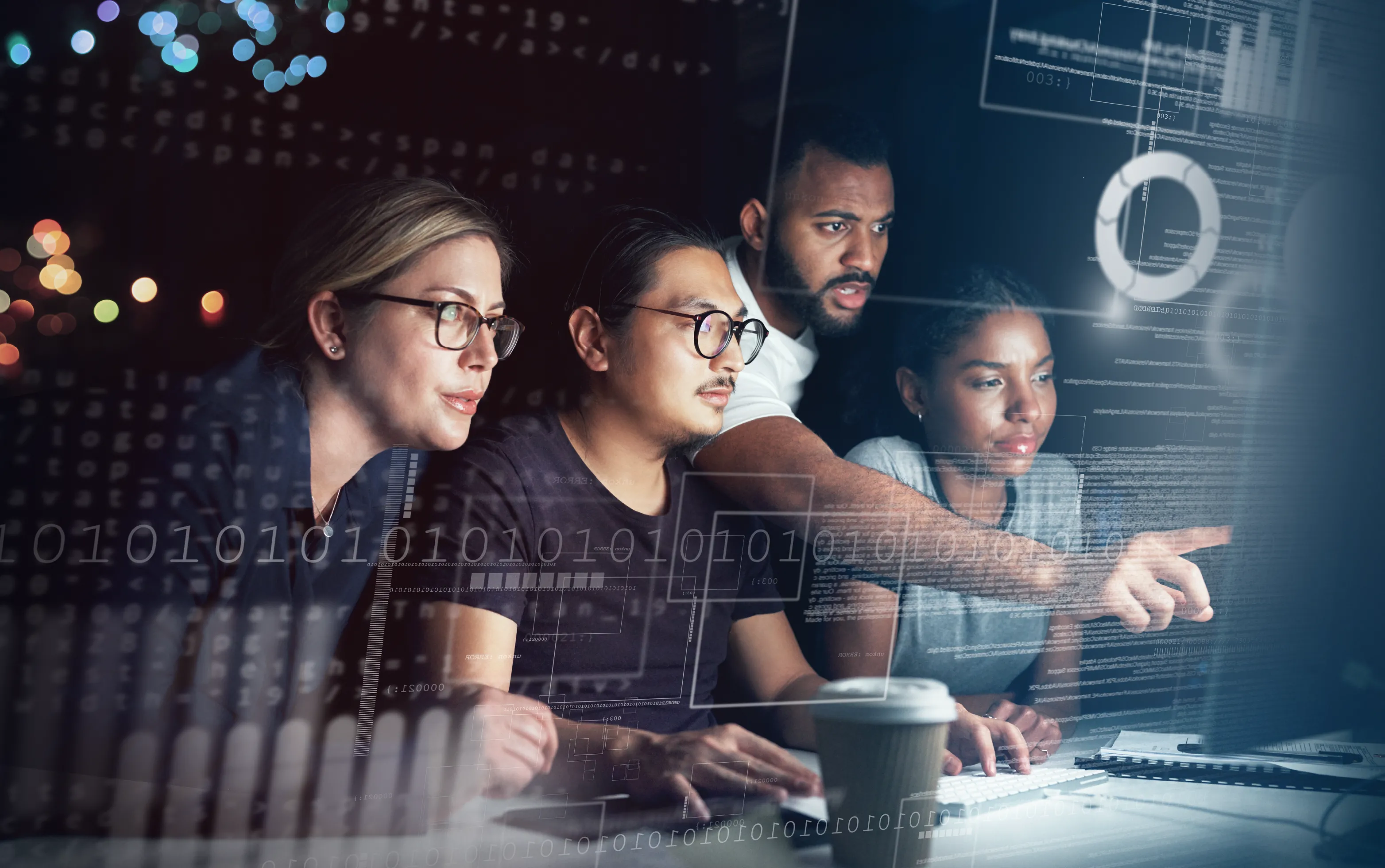 A group of four people focused on a computer screen, surrounded by digital binary code and data graphics