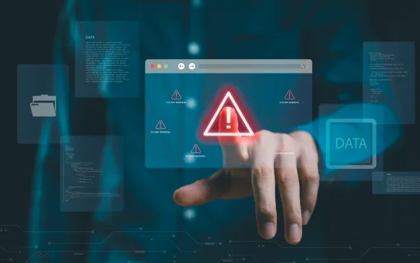 Hand interacting with a digital warning alert surrounded by data and system notifications.